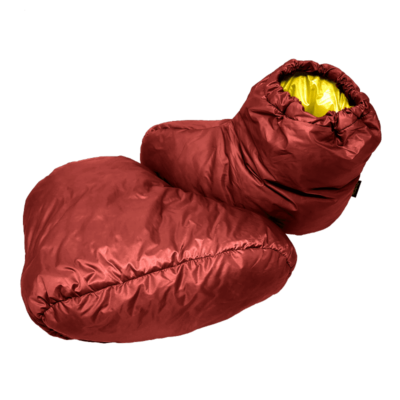 A pair of Ultralight down booties in Brick Red (shell) and Yellow (interior)